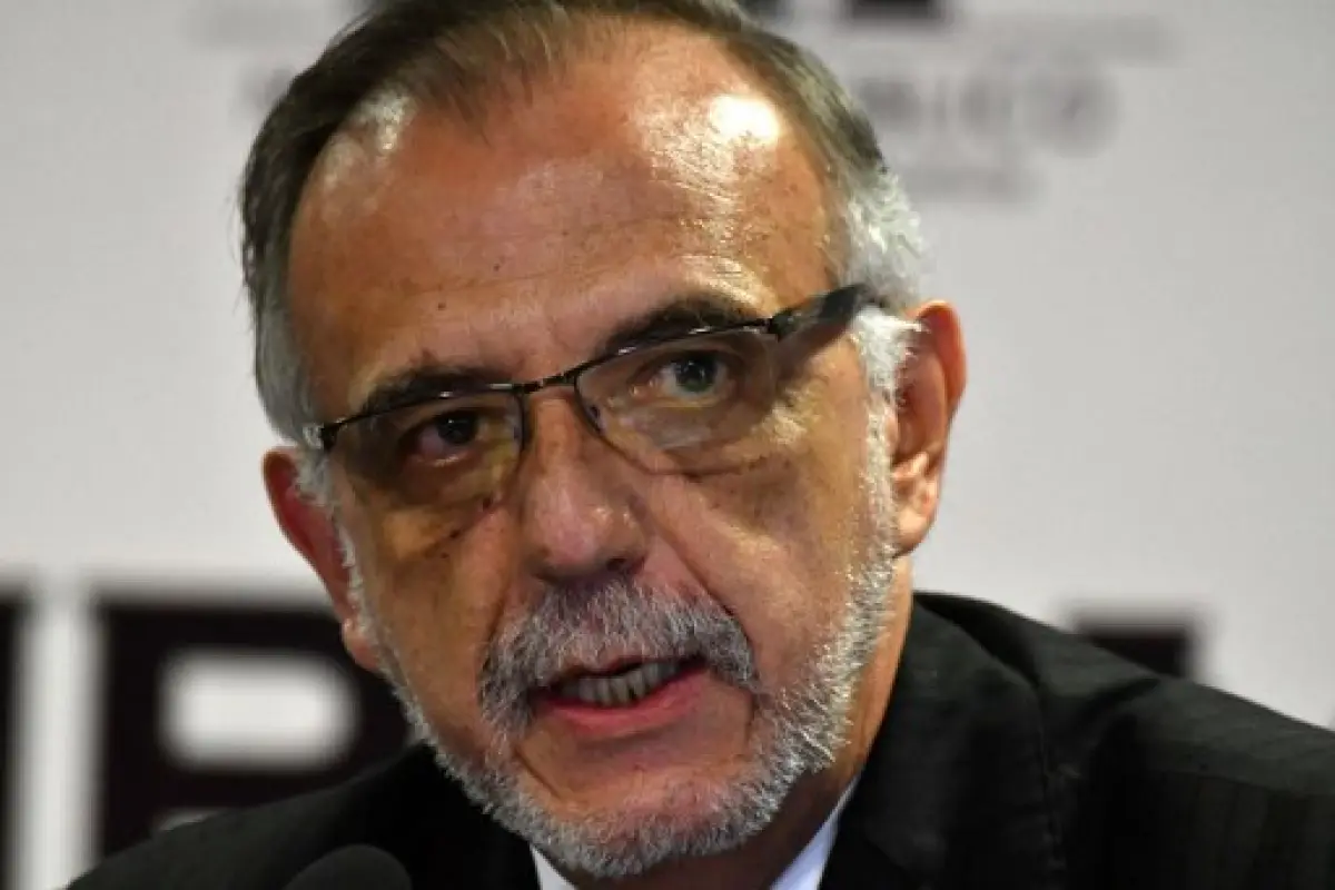 The head of the International Commission Against Impunity in Guatemala (CICIG), Ivan Velasquez of Colombia, speaks in a press conference with Guatemalan Attorney General Thelma Aldana (out of frame), in Guatemala City on August 25, 2017.
Guatemala's publi