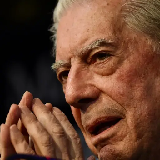 Peruvian writer Mario Vargas Llosa speaks during the presentation of his new book 'Cinco  Esquinas' (Five Corners) at the Casa America in Madrid on March 1, 2016. / AFP PHOTO / Javier SORIANO