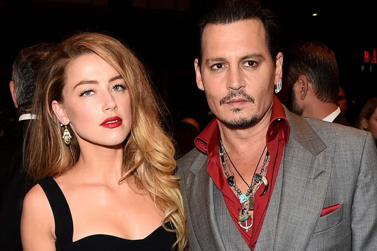 TORONTO, ON - SEPTEMBER 14:  Actors Amber Heard (L) and Johnny Depp attend the "Black Mass" premiere during the 2015 Toronto International Film Festival at The Elgin on September 14, 2015 in Toronto, Canada.  (Photo by Jason Merritt/Getty Images)