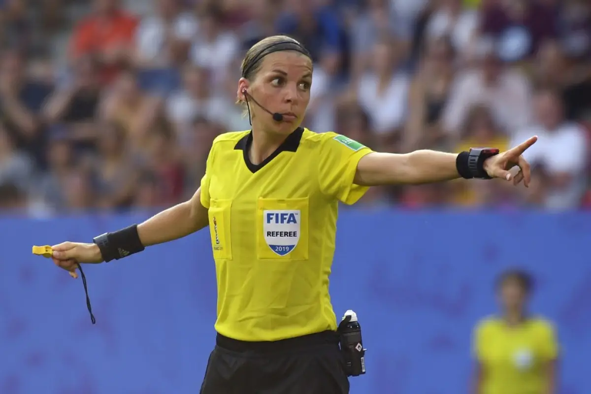 (FILES) In this file photograph taken on June 29, 2019, French referee Stephanie Frappart gestures during the France 2019 Women's World Cup quarter-final football match between Germany and Sweden at The Roazhon Park Stadium in Rennes, north-western France