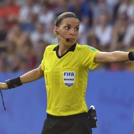(FILES) In this file photograph taken on June 29, 2019, French referee Stephanie Frappart gestures during the France 2019 Women's World Cup quarter-final football match between Germany and Sweden at The Roazhon Park Stadium in Rennes, north-western France