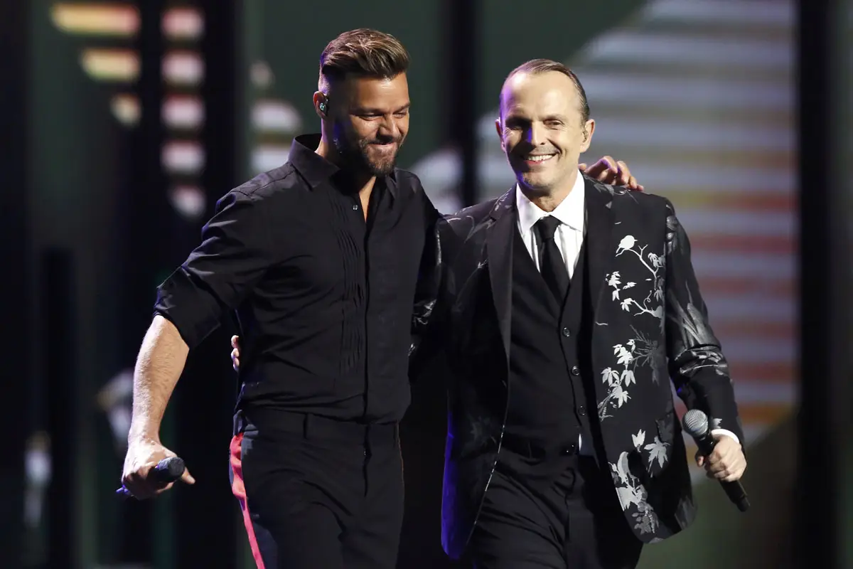 Ricky Martin (L) and Latin Recording Academy Person of the year Miguel Bose perform &quot;Bambu&quot; during the 14th Latin Grammy Awards in Las Vegas, Nevada November 21, 2013.   REUTERS/Mario Anzuoni (UNITED STATES  - Tags: ENTERTAINMENT)  (GRAMMYS-SHOW) ORG XMIT