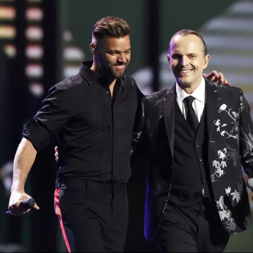 Ricky Martin (L) and Latin Recording Academy Person of the year Miguel Bose perform 