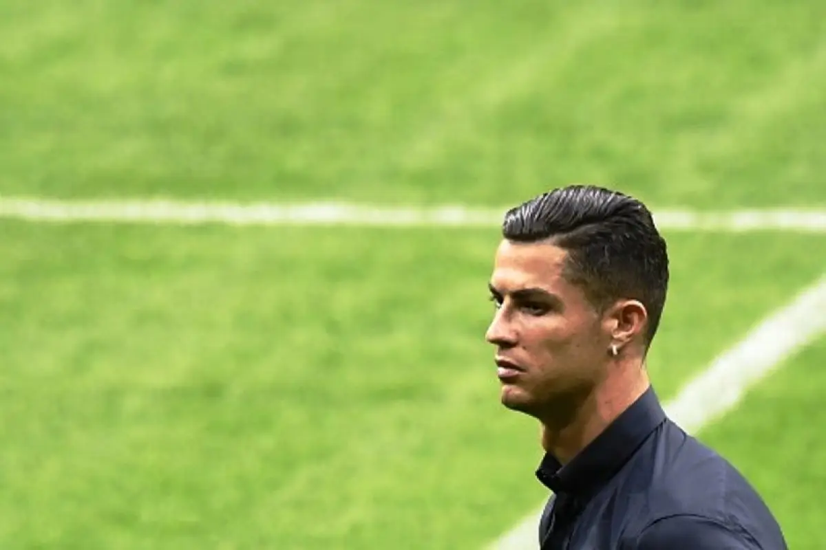 Juventus' Portuguese forward Cristiano Ronaldo walks around the Wanda Metropolitano stadium in Madrid on September 17, 2019 on the eve of the UEFA Champions League Group D football match against Atletico de Madrid. (Photo by OSCAR DEL POZO / AFP)