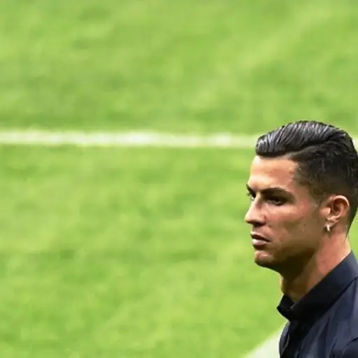 Juventus' Portuguese forward Cristiano Ronaldo walks around the Wanda Metropolitano stadium in Madrid on September 17, 2019 on the eve of the UEFA Champions League Group D football match against Atletico de Madrid. (Photo by OSCAR DEL POZO / AFP)