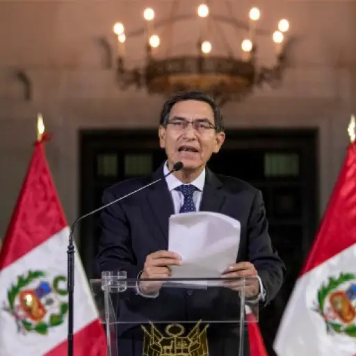 Handout picture released by national news service Andina showing Peruvian President Martin Vizcarra announcing the dissolution of the Congress on a televised message to the nation, in Lima, on September 30, 2019. - Vizcarra constitutionally dissolved the 