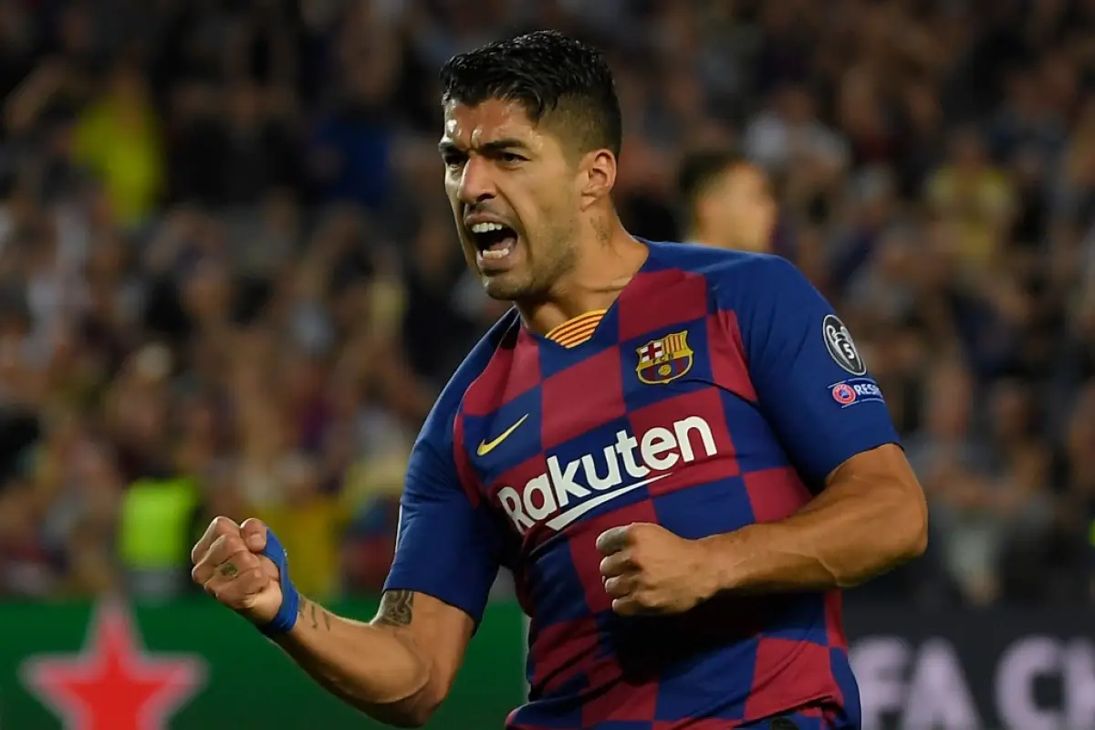 Barcelona's Uruguayan forward Luis Suarez celebrates after scoring a goal during the UEFA Champions League Group F football match between Barcelona and Inter Milan at the Camp Nou stadium in Barcelona, on October 2, 2019. (Photo by LLUIS GENE / AFP)