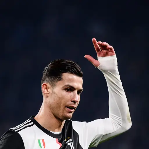 Juventus' Portuguese forward Cristiano Ronaldo reacts as he leaves the pitch to be substituted during the Italian Serie A football match Juventus vs AC Milan on November 10, 2019 at the Juventus Allianz stadium in Turin. (Photo by Marco Bertorello / AFP)
