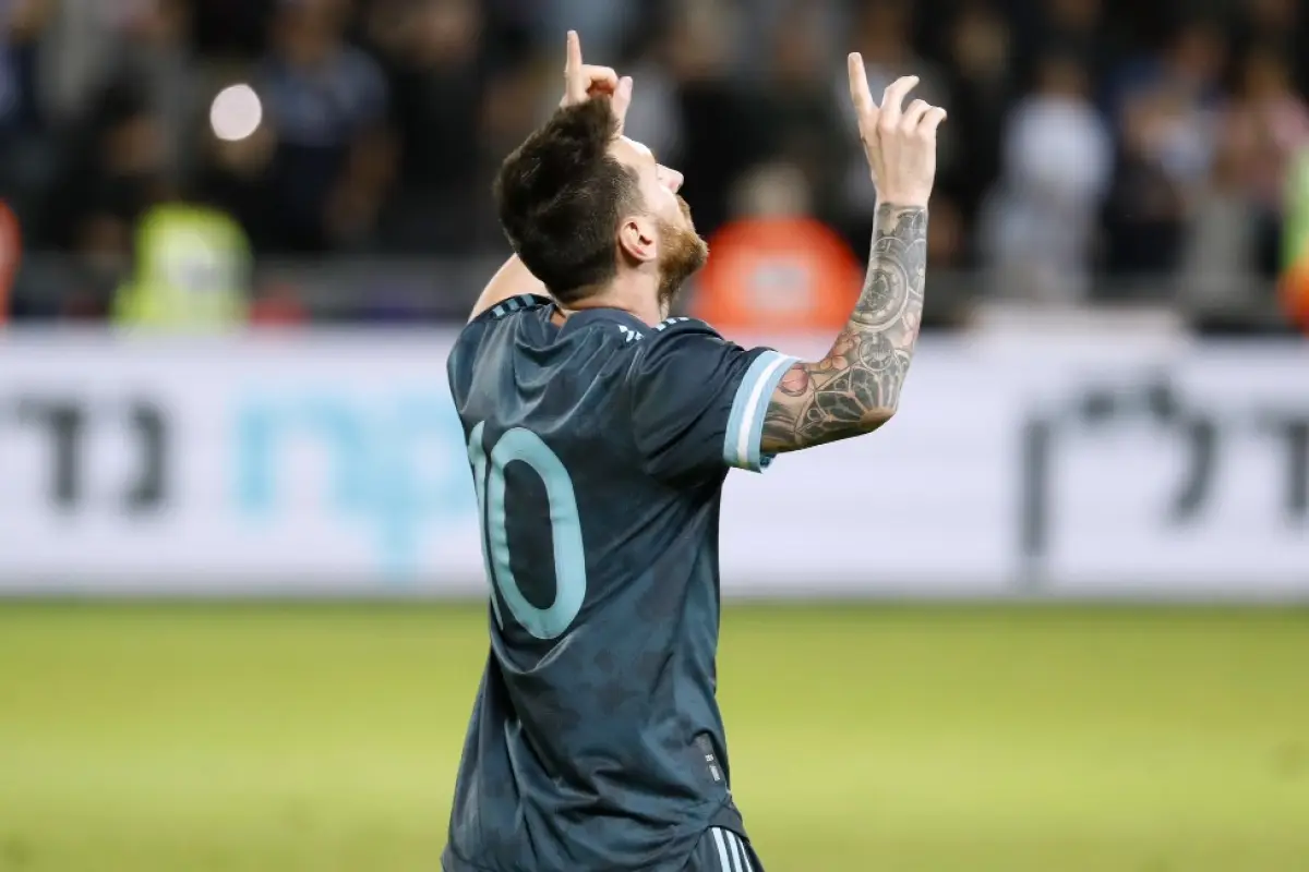 Argentina's forward Lionel Messi gestures after scoring during the friendly football match between Argentina and Uruguay at the Bloomfield stadium in the Israeli coastal city of Tel Aviv on November 18, 2019. (Photo by EMMANUEL DUNAND / AFP)