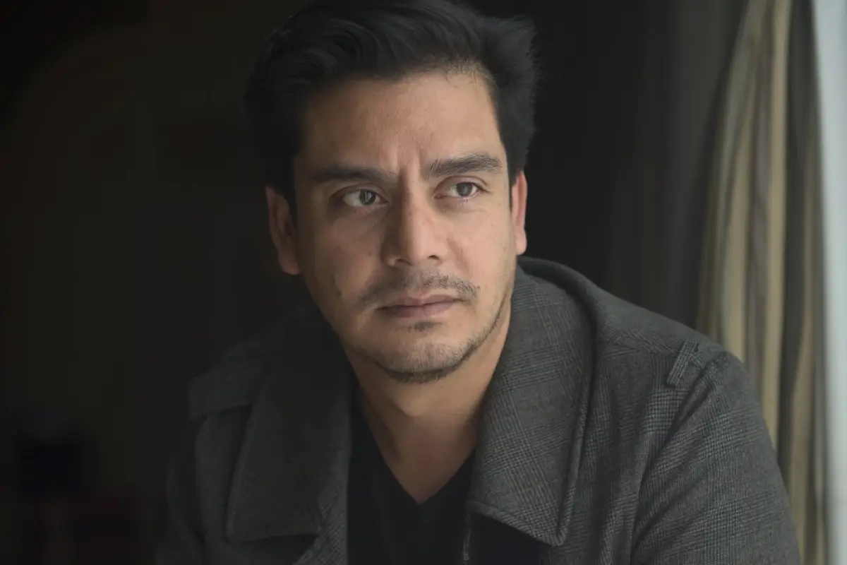 Guatemalan film director Jayro Bustamante poses during an interview for his films "Temblores / Tremors" and "La Llorona / The Weeping Woman" during the 67th San Sebastian Film Festival, in the northern Spanish Basque city of San Sebastian on September 27,