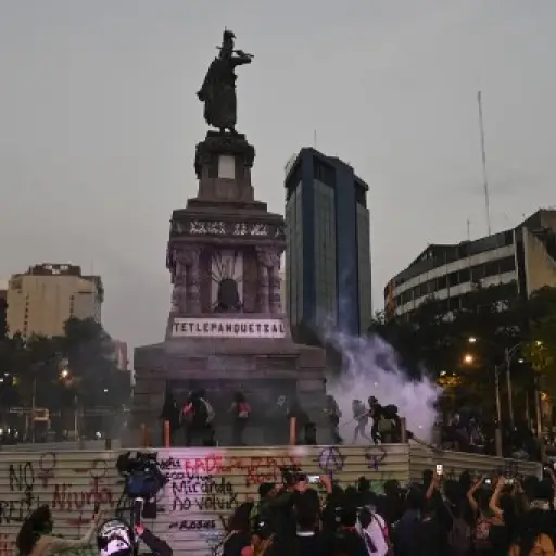 Activists protest on the commemoration of the International Day for the Elimination of Violence Against Women, in Mexico City, on November 25, 2019. (Photo by PEDRO PARDO / AFP)