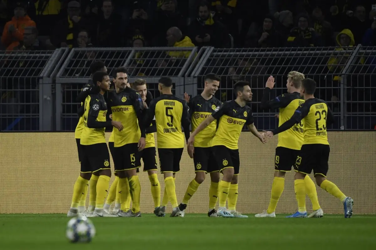 Dortmund's celebrates scoring during the UEFA Champions League Group F football match between Borussia Dortmund and SK Slavia Prague on December 10, 2019 in Dortmund, western Germany. (Photo by Ina Fassbender / AFP)