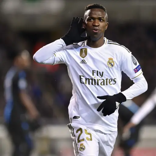 Real Madrid's Brazilian forward Vinicius Junior celebrates after scoring their second goal during the UEFA Champions League Group A football match between Club Brugge and Real Madrid CF at the Jan Breydel Stadium in Bruges on December 11, 2019. (Photo by 