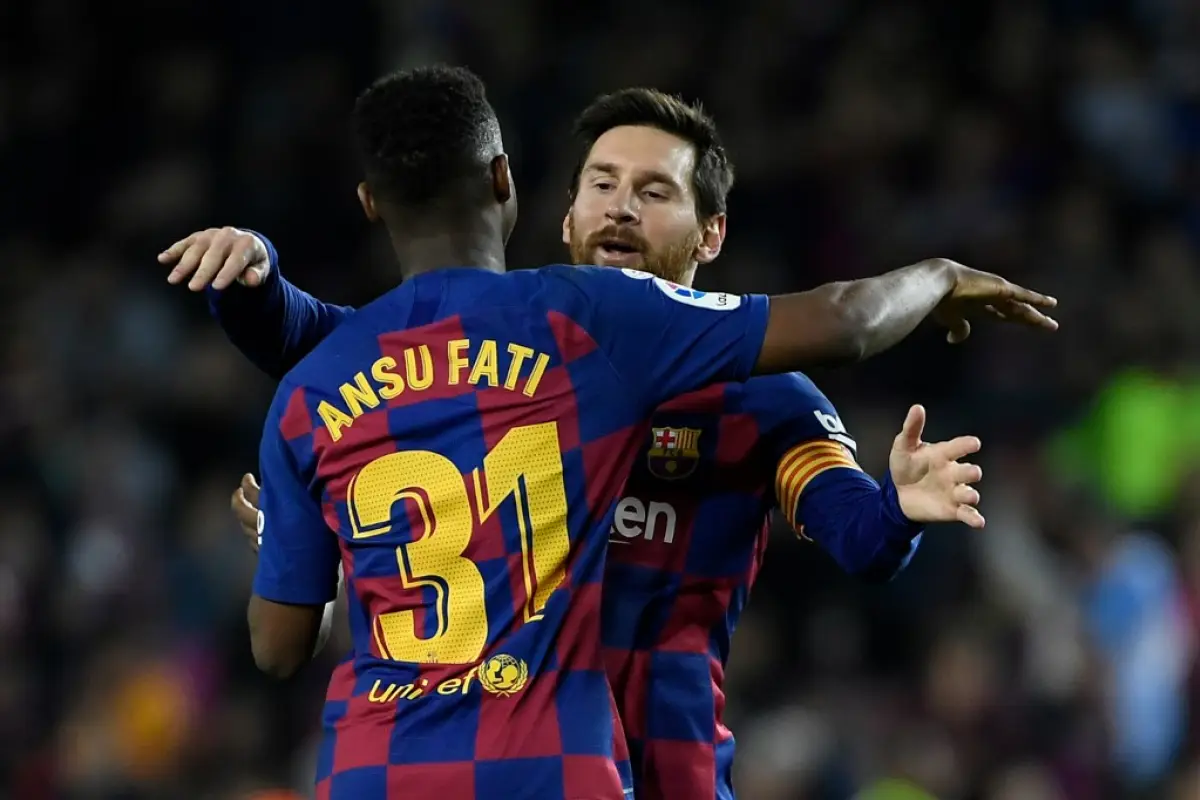 Fati celebra con Messi una de sus anotaciones contra el Levante. Foto: AFP