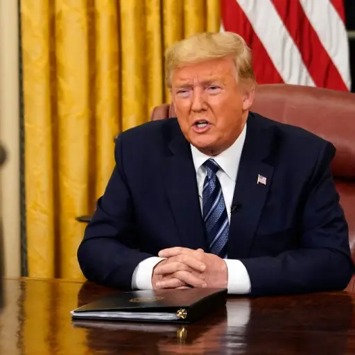 US President Donald Trump addresses the Nation from the Oval Office about the widening novel coronavirus (Covid-19) crisis in Washington, DC on March 11, 2020. - President Donald Trump announced on March 11, 2020 the United States would ban all travel fro