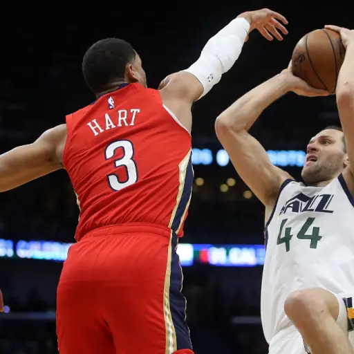 NEW ORLEANS, LOUISIANA - JANUARY 16: Bojan Bogdanovic #44 of the Utah Jazz shoots the ball over Josh Hart #3 of the New Orleans Pelicans at Smoothie King Center on January 16, 2020 in New Orleans, Louisiana. NOTE TO USER: User expressly acknowledges and a