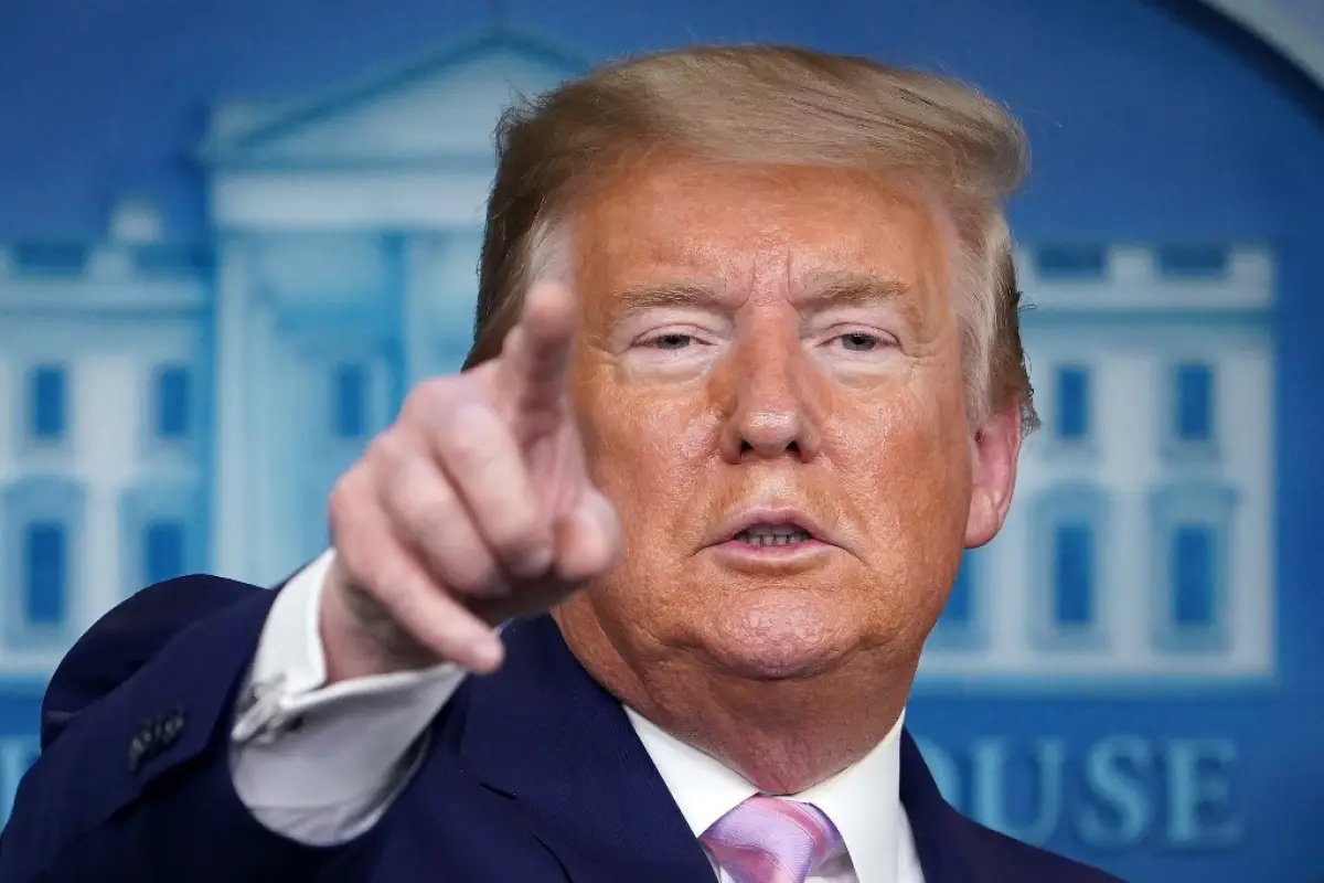 US President Donald Trump gestures as he speaks during the daily briefing on the novel coronavirus, COVID-19, in the Brady Briefing Room at the White House on April 1, 2020, in Washington, DC. (Photo by MANDEL NGAN / AFP)