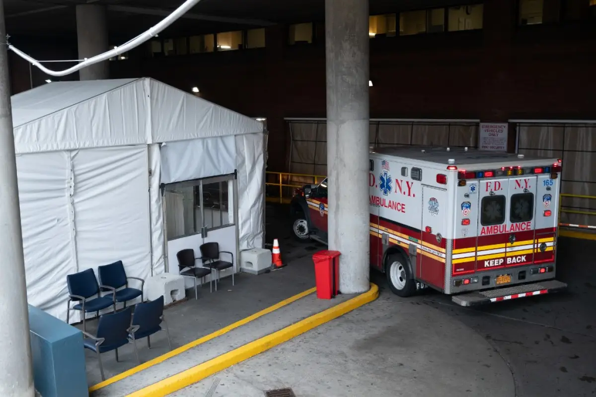 NEW YORK, NY - APRIL 9: An ambulance pulls into the triage area of the Montefiore Medical Center's emergency room on April 9, 2020 in New York City. New York Governor Andrew Cuomo said that while signs show that measures taken by New Yorkers are beginning