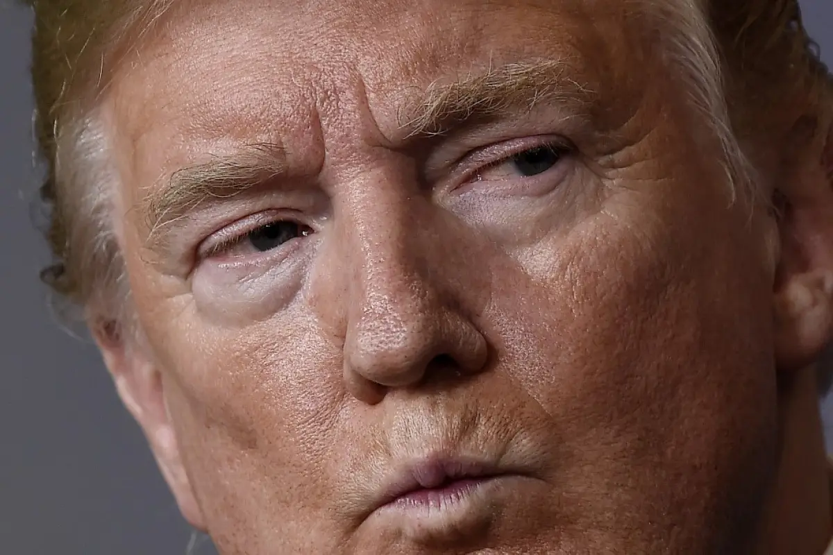 US President Donald Trump looks on during the daily briefing on the novel coronavirus, which causes COVID-19, in the Brady Briefing Room of the White House on April 24, 2020, in Washington, DC. (Photo by Olivier DOULIERY / AFP)