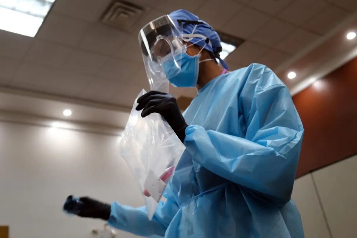 NEW YORK, NY - MAY 13: Medical workers in personal protective equipment (PPE) test for COViD-19 at Abyssinian Baptist Church, one of 11 churches across the city as well as Nassau County and Westchester that has begun testing for the virus on May 13, 2020 