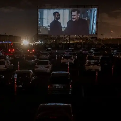 General view of at a drive-in cinema at Carrasco International Airport in Ciudad de la Costa, Canelones Department, near the Uruguayan capital Montevideo, on May 23, 2020. (Photo by Pablo PORCIUNCULA / AFP)