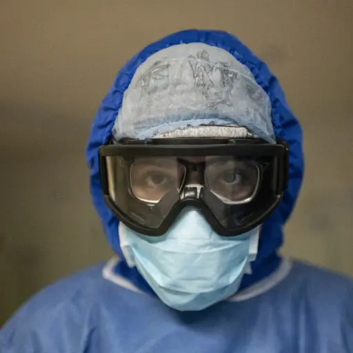 A health worker prepares to the COVID-19 zone of a hospital in Atizapan, Mexico, on May 22, 2020, amid the new coronavirus pandemic. (Photo by PEDRO PARDO / AFP)