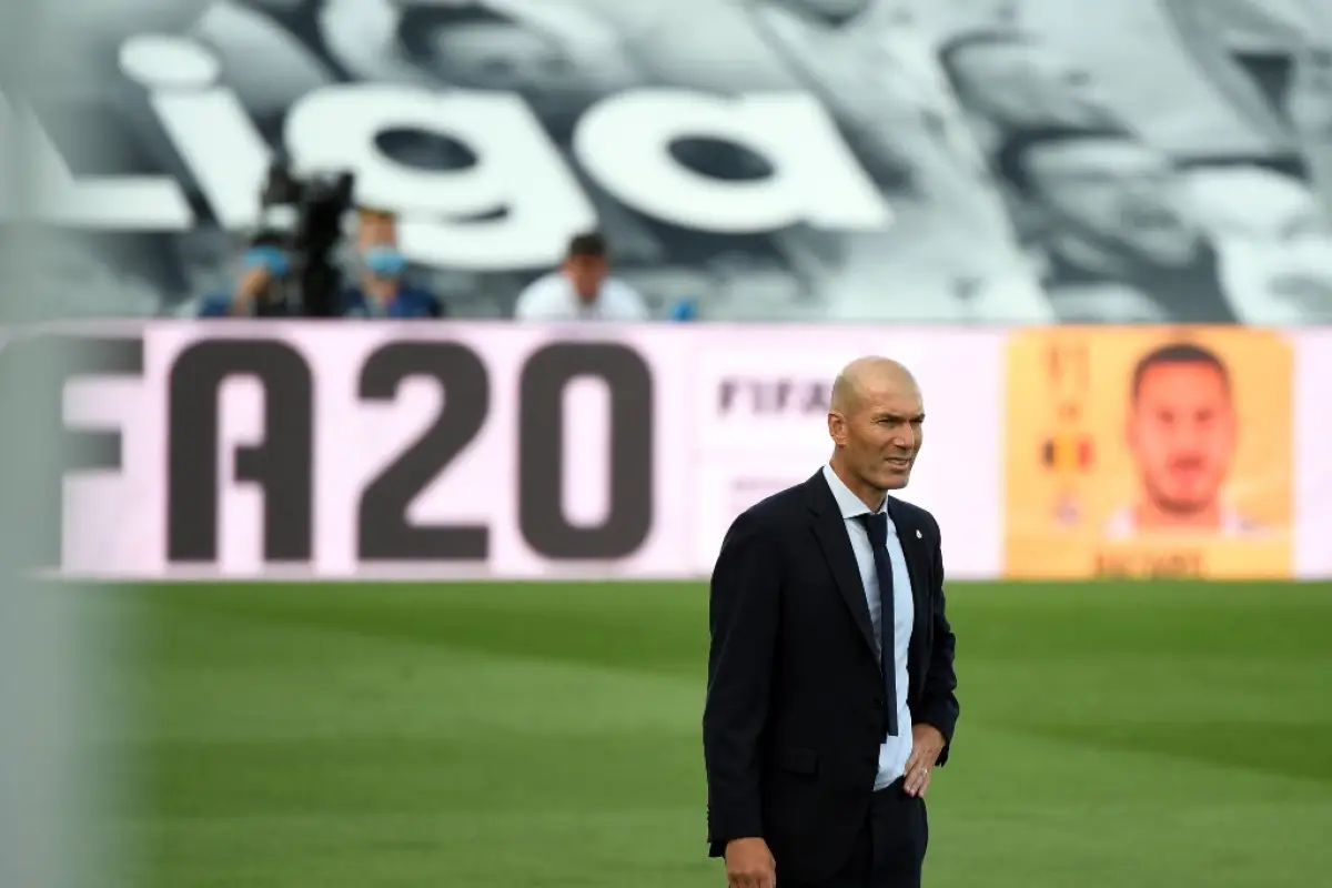 Real Madrid's French coach Zinedine Zidane stands on the sideline during the Spanish League football match between Real Madrid CF and SD Eibar at the Alfredo di Stefano stadium in Valdebebas, on the outskirts of Madrid, on June 14, 2020. (Photo by PIERRE-