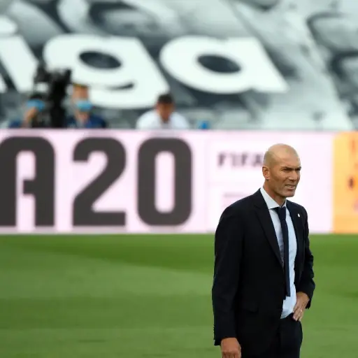 Real Madrid's French coach Zinedine Zidane stands on the sideline during the Spanish League football match between Real Madrid CF and SD Eibar at the Alfredo di Stefano stadium in Valdebebas, on the outskirts of Madrid, on June 14, 2020. (Photo by PIERRE-