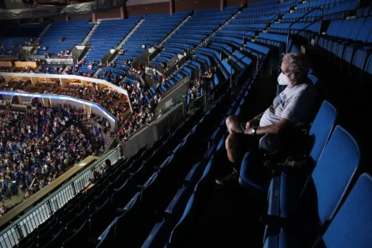 TULSA, OKLAHOMA - JUNE 20: A supporter sits in the upper seats during a campaign rally for U.S. President Donald Trump at the BOK Center, June 20, 2020 in Tulsa, Oklahoma. Trump is holding his first political rally since the start of the coronavirus pande