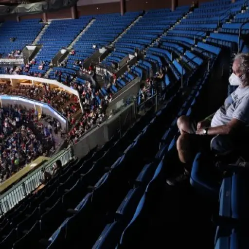 TULSA, OKLAHOMA - JUNE 20: A supporter sits in the upper seats during a campaign rally for U.S. President Donald Trump at the BOK Center, June 20, 2020 in Tulsa, Oklahoma. Trump is holding his first political rally since the start of the coronavirus pande