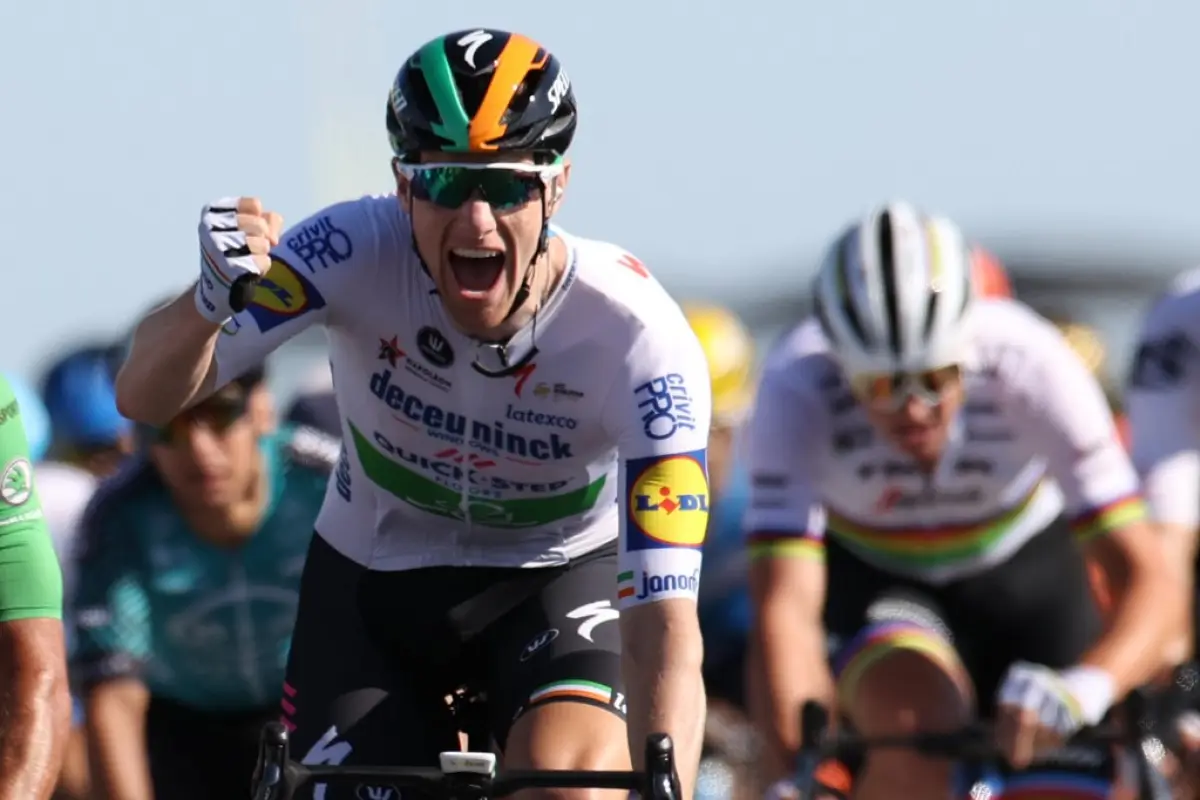 Stage winner Team Deceuninck rider Ireland's Sam Bennett celebrates as he crosses the finish line at the end of the 10th stage of the 107th edition of the Tour de France cycling race, 170 km between Le Chateau d'Oleron and Saint Martin de Re, on September