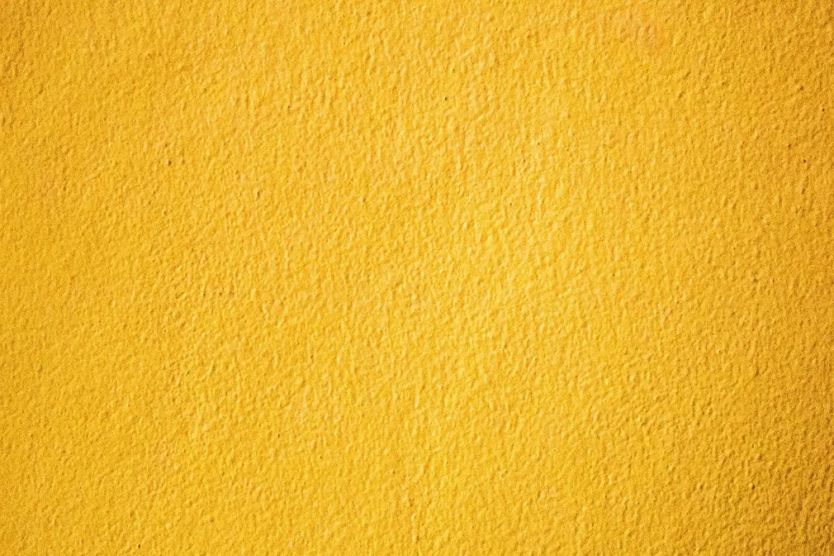 Abstract Luxury Clear Yellow wall well use as backdrop,background and layout.