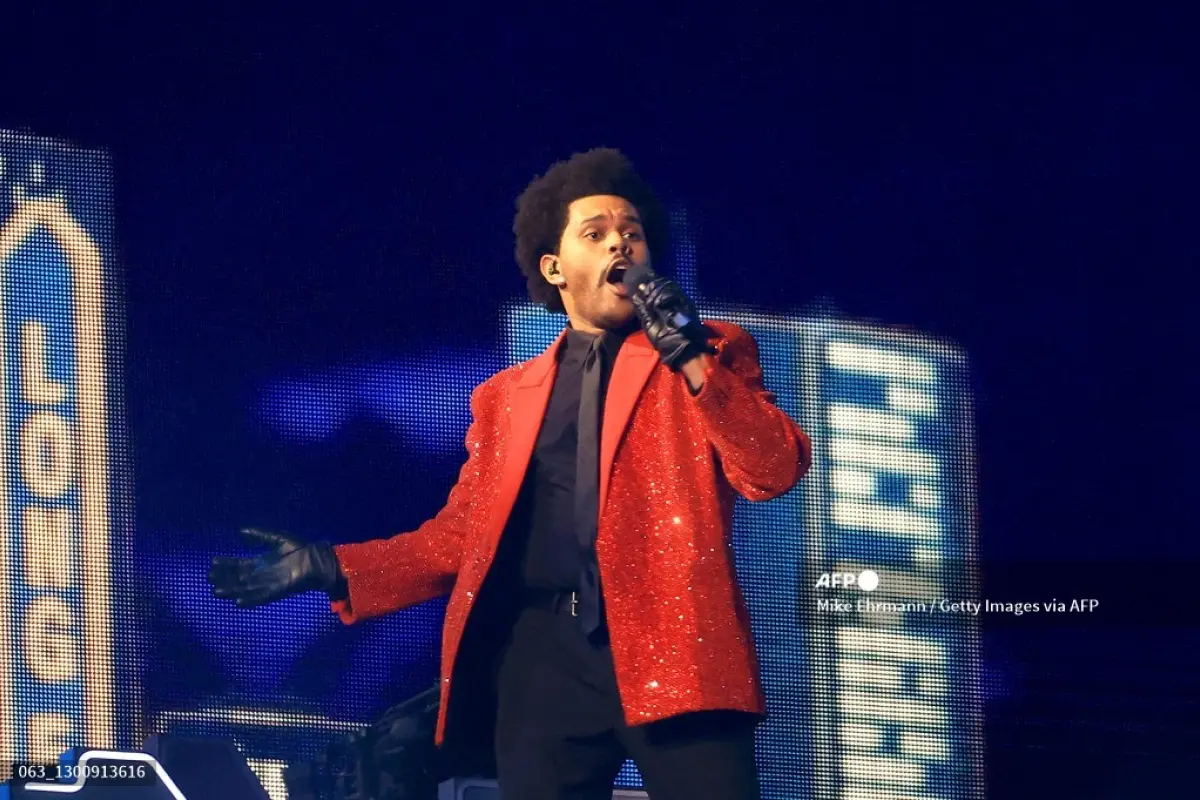 TAMPA, FLORIDA - FEBRUARY 07: The Weeknd performs during the Pepsi Super Bowl LV Halftime Show at Raymond James Stadium on February 07, 2021 in Tampa, Florida.   Mike Ehrmann/Getty Images/AFP