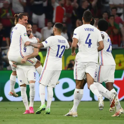 BUDAPEST, HUNGARY - JUNE 23: Karim Benzema of France celebrates with teammate Antoine Griezmann and Corentin Tolisso after scoring their side's second goal during the UEFA Euro 2020 Championship Group F match between Portugal and France at Puskas Arena on