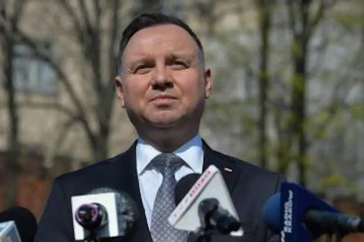 Polish President Andrzej Duda stops to address the media outside Wawel castle on his return from the visit of a sarcophagus where President Lech Kaczynski and First Lady Maria Kaczynska were laid to rest.
Ten years ago, in the early hours of the morning, 