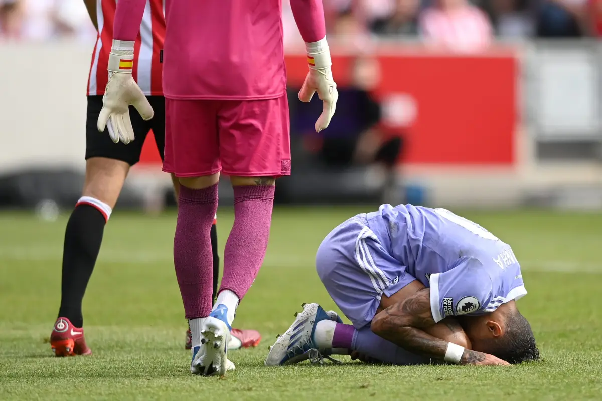 BRENTFORD, ENGLAND - MAY 22: Raphinha of Leeds United goes down after being fouled by David Raya of Brentford leading to a penalty being awarded during the Premier League match between Brentford and Leeds United at Brentford Community Stadium on May 22, 2