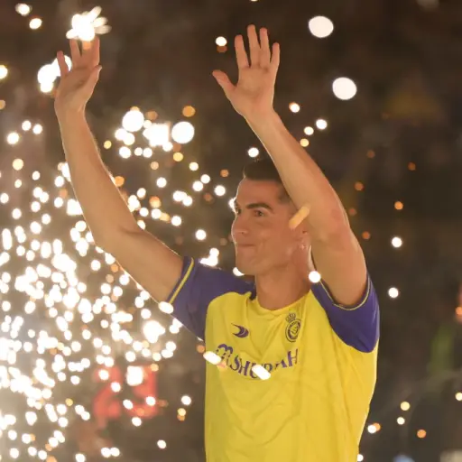 Al-Nassr's new Portuguese forward Cristiano Ronaldo greets the fans during his unveiling at the Mrsool Park Stadium in the Saudi capital Riyadh on January 3, 2023. (Photo by Fayez Nureldine / AFP)