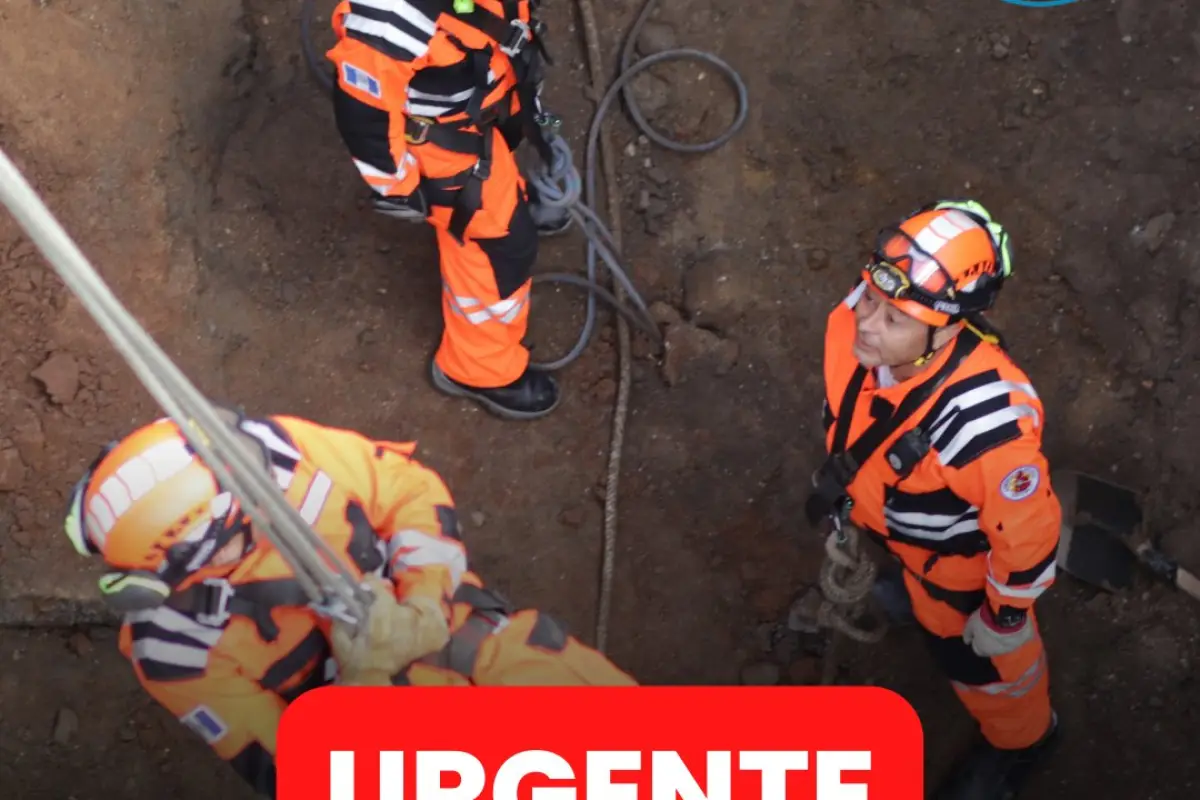 Los Bomberos Voluntarios rescataron los cuerpos de la laguna en Izabal. / Foto: CVB