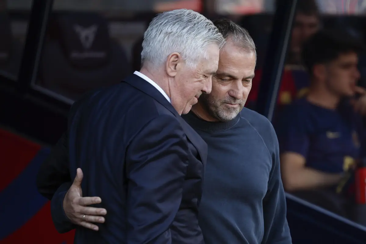Hansi Flick junto a Carlo Ancelotti - EFE