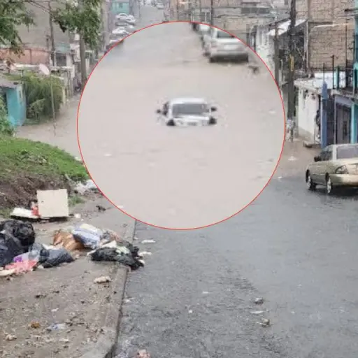  Un vehículo queda varado en medio de la inundación en zona 18. ,Redes sociales