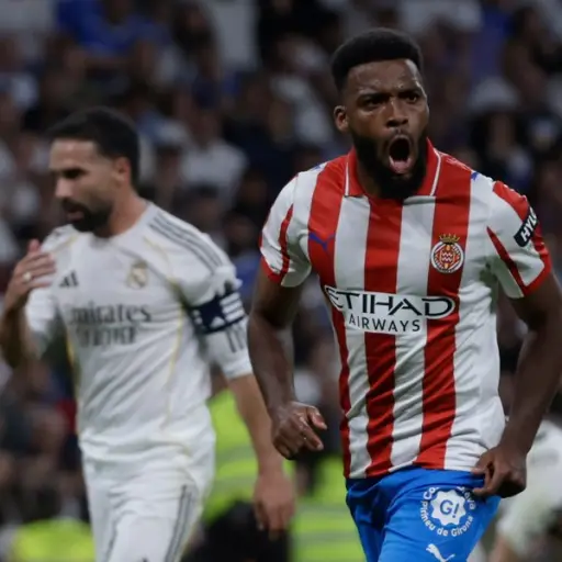 Thomas Lemar celebrando ante el Real Madrid en el estadio Santiago Bernabéu 