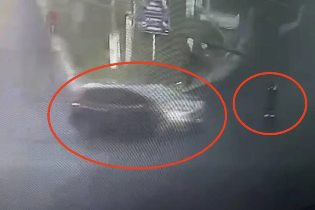 Automovilista atropella a agente de la PMT., Captura de pantalla video de Facebook.