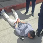 Uno de los presuntos sicarios fue reducido al orden, reportaron las autoridades. ,PNC de Guatemala.