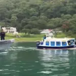 Equipos de socorro realizan labores de búsqueda tras caer un helicóptero al lago de Atitlán. ,Bomberos Voluntarios