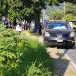 Área donde fue localizado el cadáver dentro de un carro en Villa Canales. ,Bomberos Voluntarios